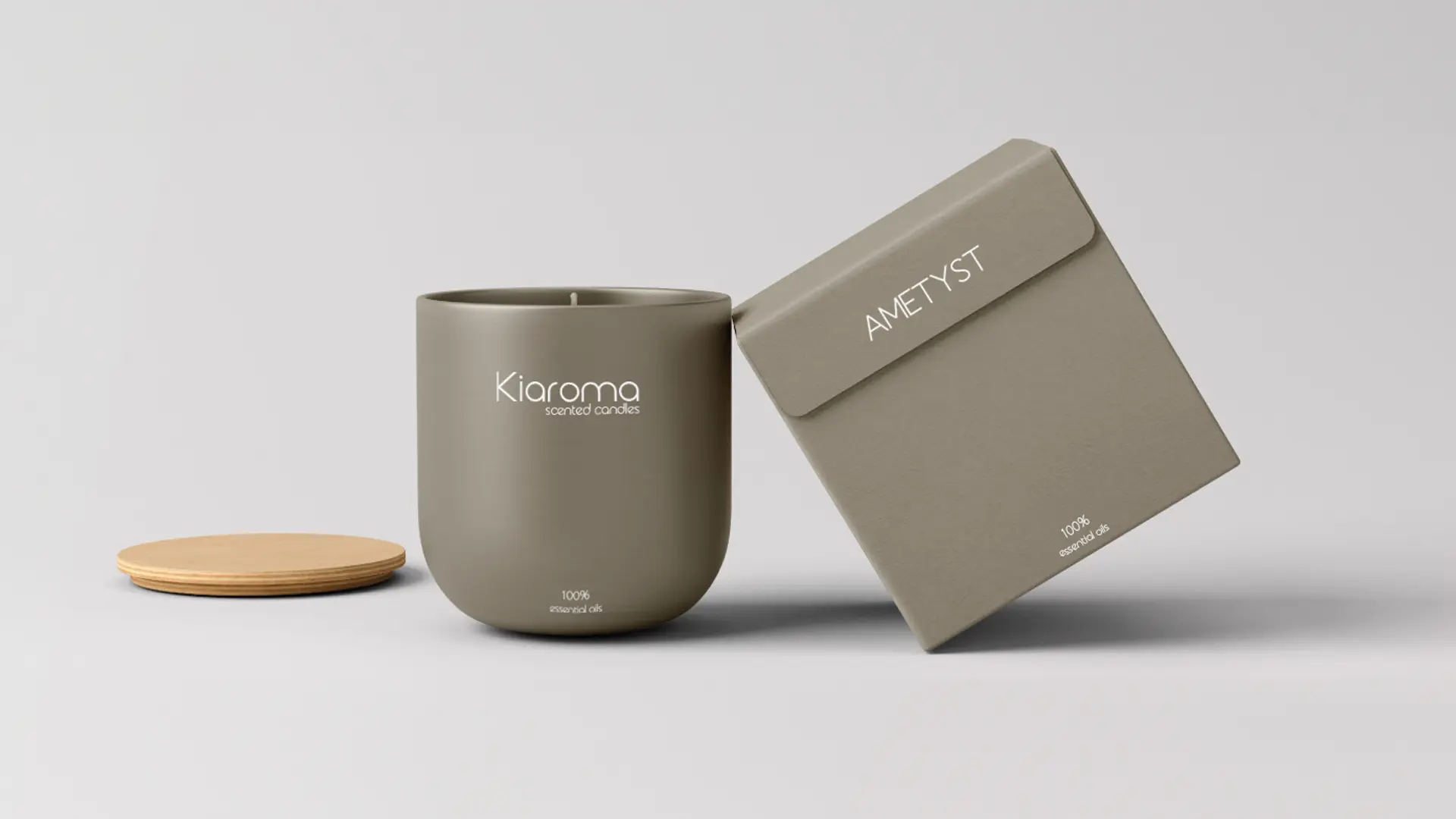 Product design for Kiaroma Scented candles showing a box and a candle jar with branding on it.